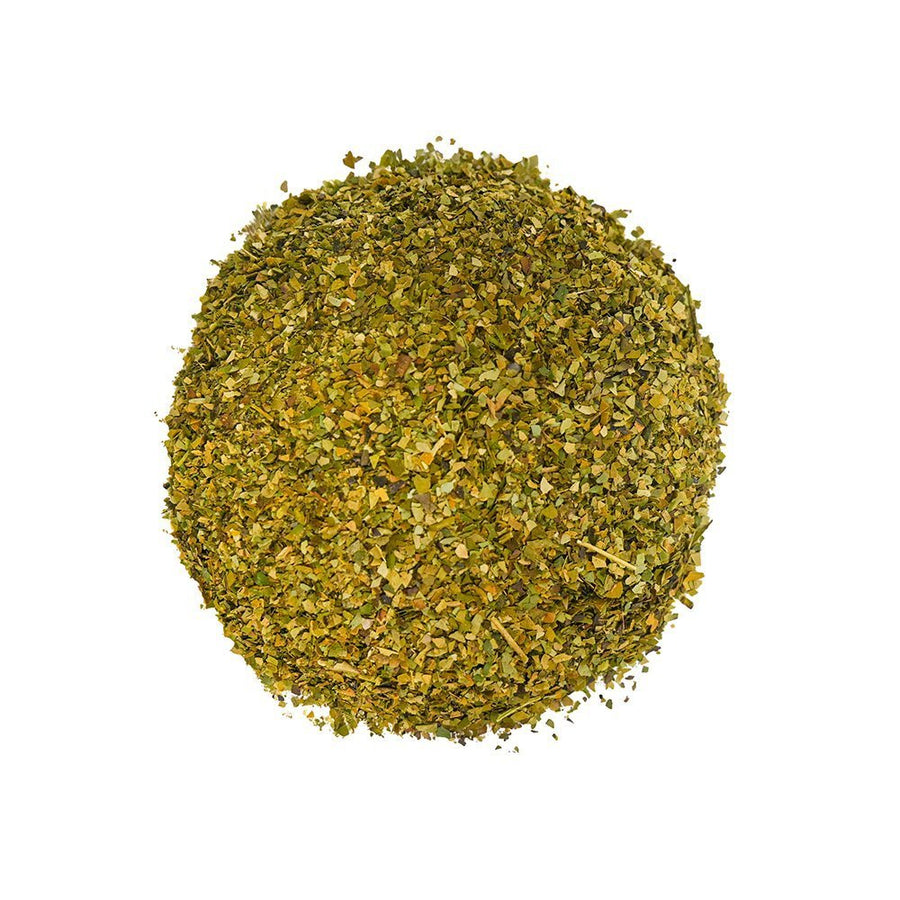 Positively Botanicals Organic Guayusa herbal supplement, showcasing finely cut dried leaves rich in natural caffeine.