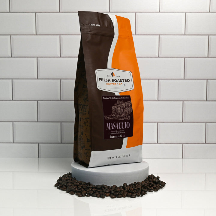 Fresh Roasted Coffee Masaccio espresso blend, 2 lb bag displayed with whole beans, featuring medium-dark Intensity 8 roast and tasting notes of brown butter, cardamom, and fudge brownie.