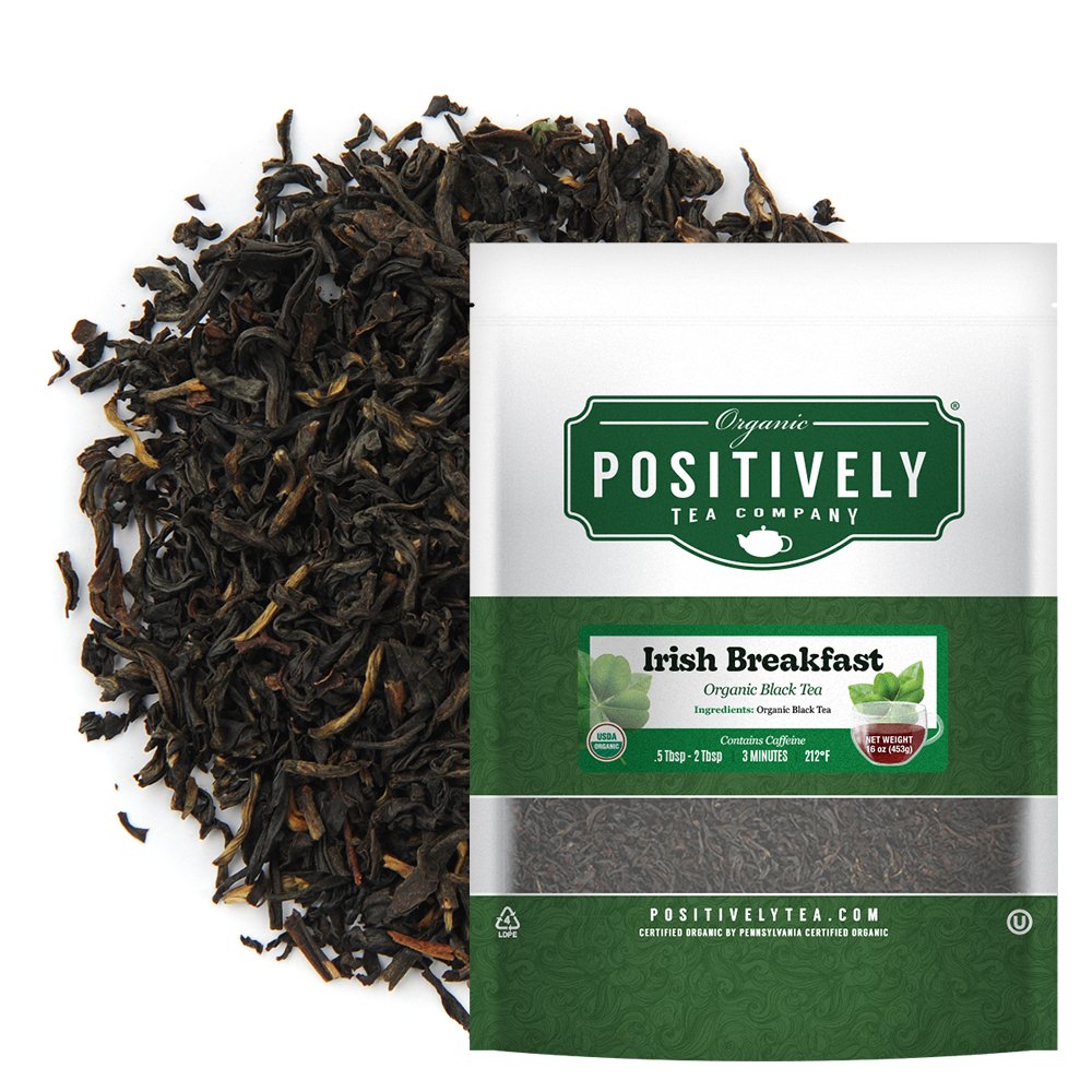 Positively Tea Company Irish Breakfast Organic Black Tea, 16oz bag displayed with loose tea leaves, highlighting a bold and hearty flavor profile.