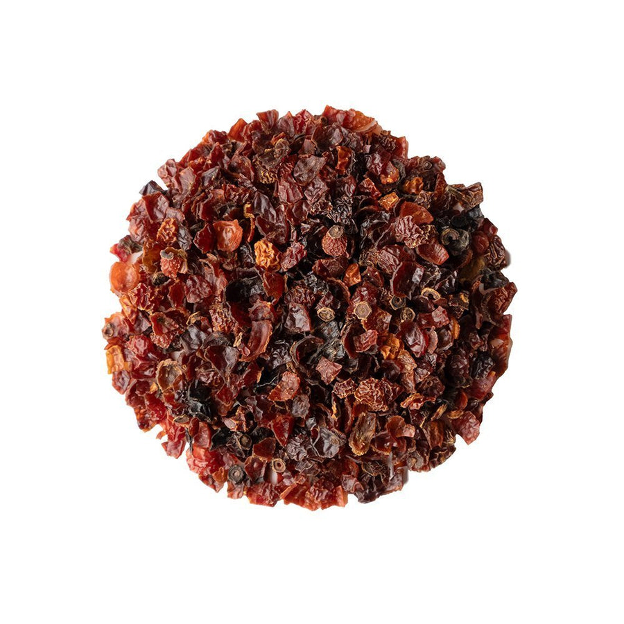 Positively Botanicals Organic Rosehips herbal supplement, showcasing dried crushed rosehip pieces naturally rich in vitamin C and antioxidants.